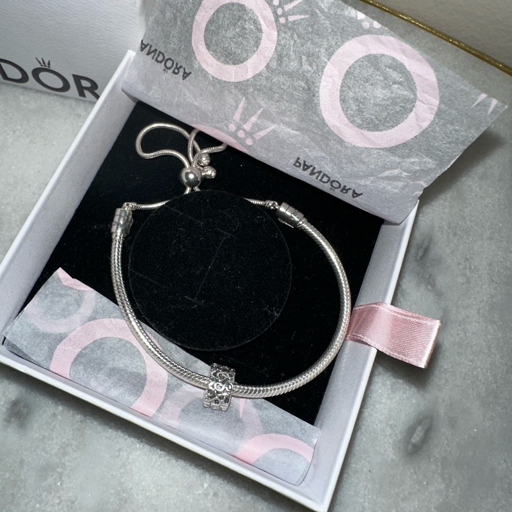 Authentic Pandora Sterling Silver Bracelet with one Clip